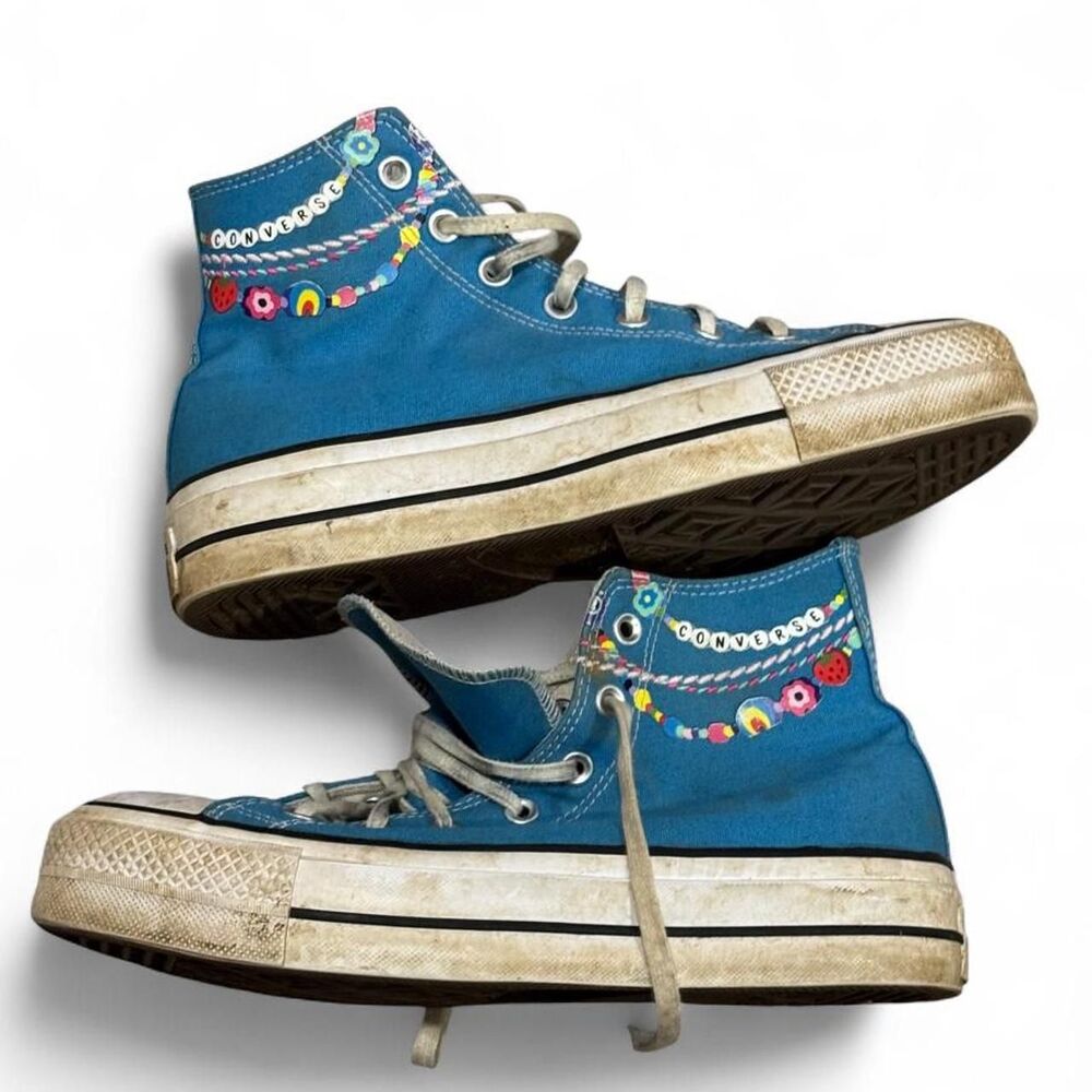 Blue Converse high top sneakers with colorful beaded trim